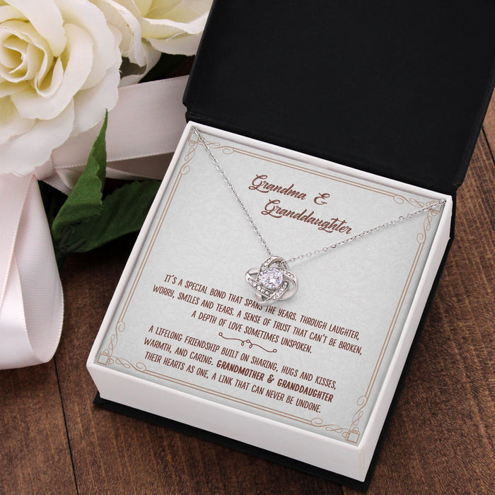 Grandma And Granddaughter Their Hearts As One, A Link That Can Never Be Undone - Gift For Grandma, Granddaughter, Mother's Day Gift - Love Knot Necklace with Message Card